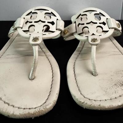 These are Tory Burch women’s leather thong sandals (Brazil-made), heavily worn.
