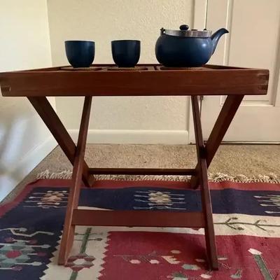 Sleepware Teapot atop Wood Accent Table 