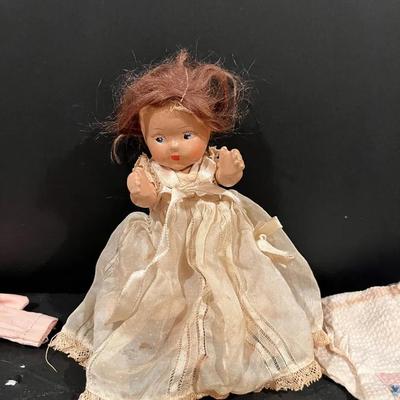 Vintage 8” Girl Doll with More Than 9 Outfits 