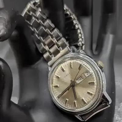 Timex Gray Face And Gray Numerals.