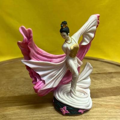 A modern resin figurine of a Chinese Dunhuang style dancer