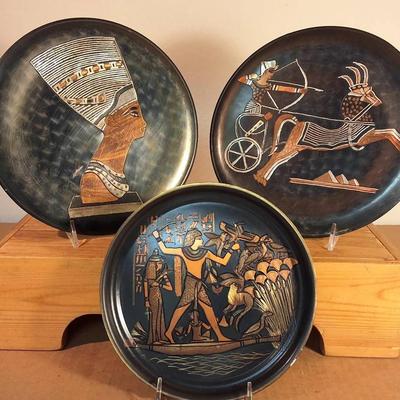Decorative Egyptian-Themed Metal Plates with Raised Figural Scenes
