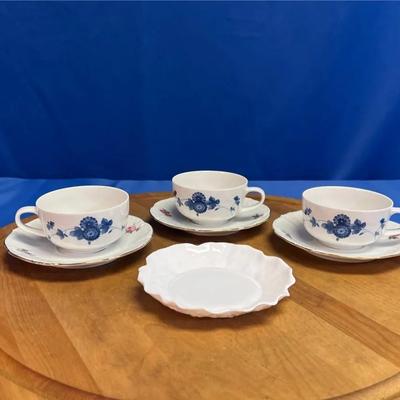 Arzberg teacups with Winterling saucers featuring blue floral pattern