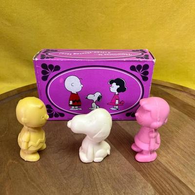 Vintage Avon Peanuts figural soaps featuring Snoopy, Charlie Brown, and Lucy