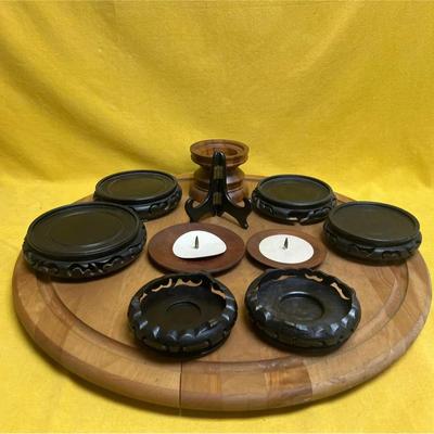 A collection of vintage carved rosewood and wood display stands