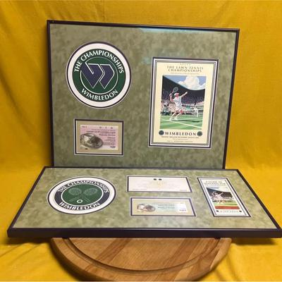 Framed Wimbledon memorabilia collection with logos, tickets, and posters