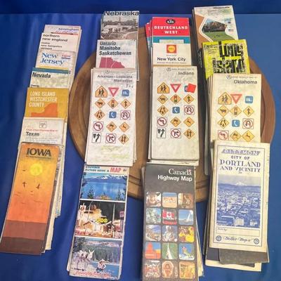 A collection of vintage US state and international road maps