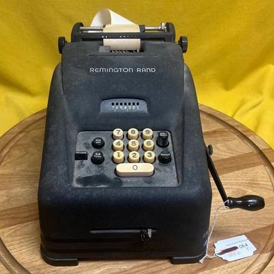 Vintage Remington Rand mechanical adding machine with hand crank