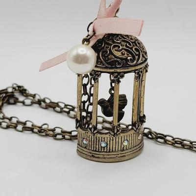 Birdcage Motion Pendant Necklace with Ribbon Accent 