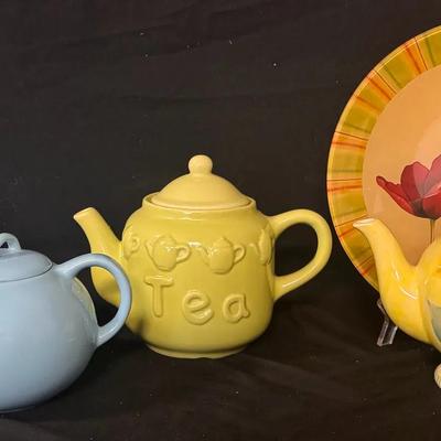 Group of 4 Decorative Teapots with Floral Plate