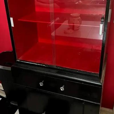 Art Deco–Style Black Cabinet with Red Display Interior