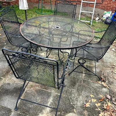 Round Metal Patio Table with Four Matching Chairs