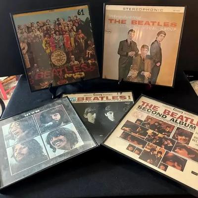 Framed Beatles Album Cover Collection Featuring Iconic Releases