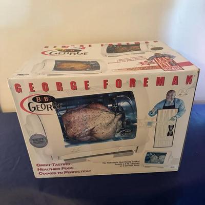 209: Baby George Foreman Rotisserie Cooker 