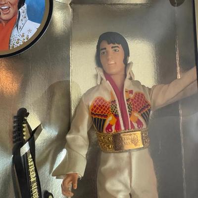 Lot 111:  Elvis With Guitar And Microphone 