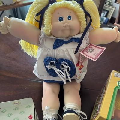 257: Cabbage Patch Doll Collection Dolls, Ornaments,Bank & Poseable Figures 