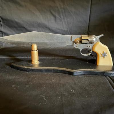 301: Western-Themed Knife and Replica Lot with Wyatt Earp Pocket Knife and John Wayne Display Knife 