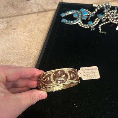 Sale Photo Thumbnail #240: H-e-r-m-e-s style enamel cuff bracelet. $25. 