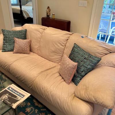 Sale Photo Thumbnail #493: 1980s off white leather sofas. 2 available. $350 each. 