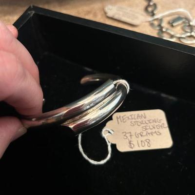 Sale Photo Thumbnail #207: Vintage Mexican sterling silver heavy bangle. 37 grams, $108. 