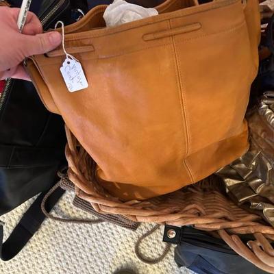 Sale Photo Thumbnail #94: Vintage leather coach bag. $52. 