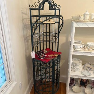 Sale Photo Thumbnail #116: Gorgeous wrought iron corner w-i-n-e- rack. In great vintage condition. Lovely deep green. $325. 