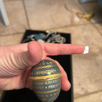 Sale Photo Thumbnail #243: Capricorn porcelain egg. $32. 