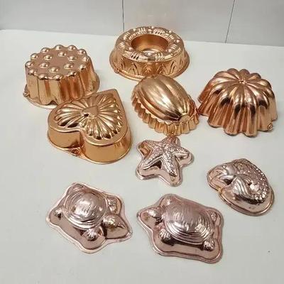 Collection Of Vintage Coppertone Aluminum Molds