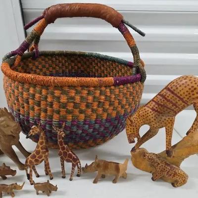 African Hand-Carved Animal Figurine Collection with Colorful Woven Basket