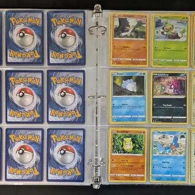 Over 100 Pokémon Cards in 3 Ring Binder