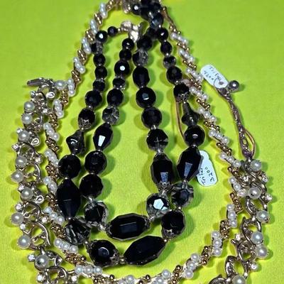 A grouping of trifari necklaces