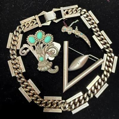 Blue cabochon floral brooch other similar pieces