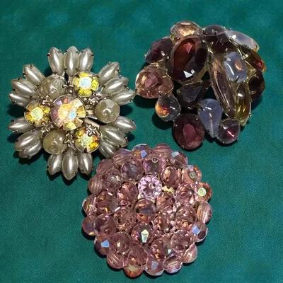 Trio of rhinestone brooches