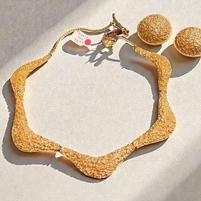 Mosell textured gold necklace and earring set