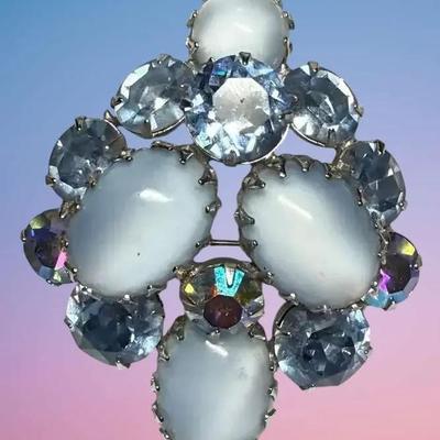 Domed blue moonstone cabochon and blue rhinestone brooch