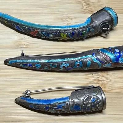 Three chinese fingernail guard pins