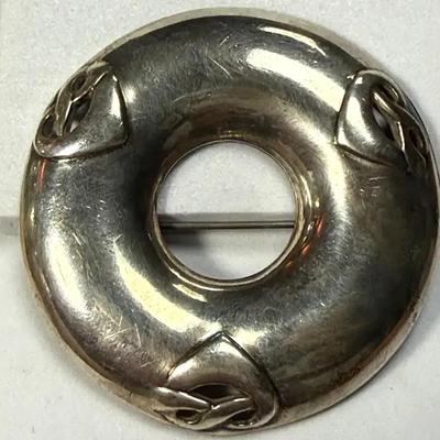 Silver donut" brooch