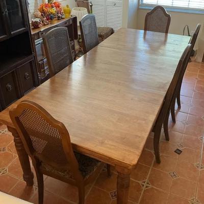 Farmhouse Style Wooden Table With Six Cane Back Chairs #1