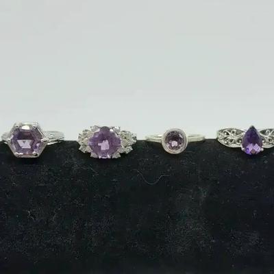Four Sterling Silver Amethyst Rings 