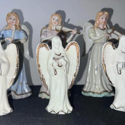 Trios of angels with Musical Instruments