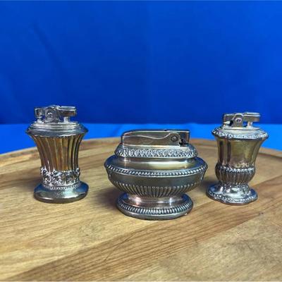 A collection of vintage Ronson silver-plated table lighters