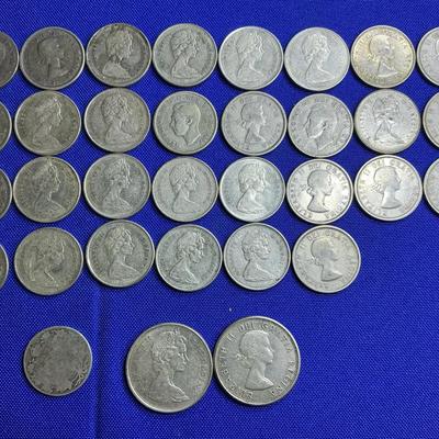 Canadian Silver Coins $.25 And $.50 Pieces