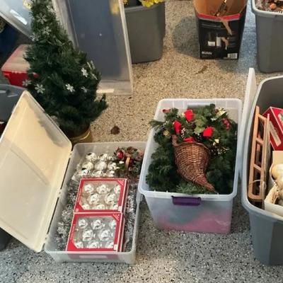 Assortment of Christmas Decorations and Small Tree
