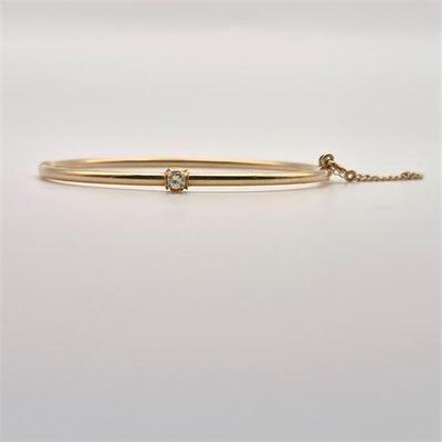 Sale Photo Thumbnail #5: Lot 005 
14K Yellow Gold & Diamond Bangle Bracelet