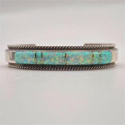 Sale Photo Thumbnail #11: Lot 011  
Sterling Silver Vintage Navajo Cuff Bracelet w/ Opal Signed "F"