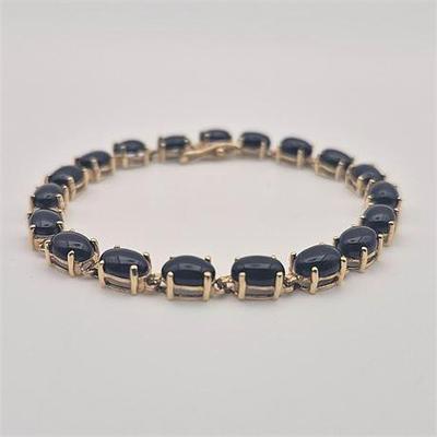 Sale Photo Thumbnail #14: Lot 014 
14K Yellow Gold Onyx Tennis Bracelet