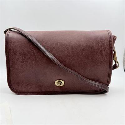 Sale Photo Thumbnail #36: Lot 200-005  
Coach Cross Body Bag No. 0241904 Burgundy Leather, 1990s