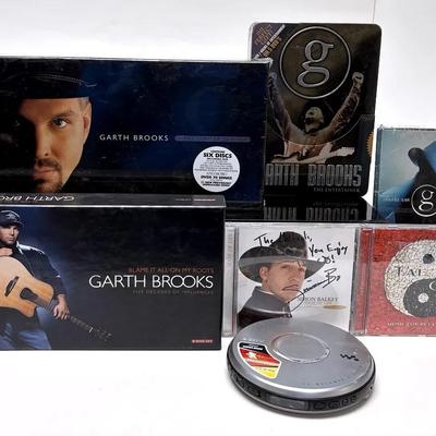 "Garth Brooks," Signed "Simon Balkey" and Portable CD Player