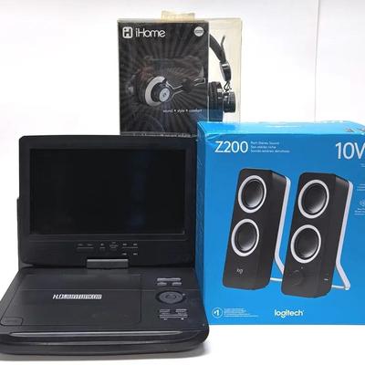 Headphones, Speakers, and Portable DVD Player Entertainment Set