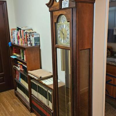 Book cases, books, grandfather clock